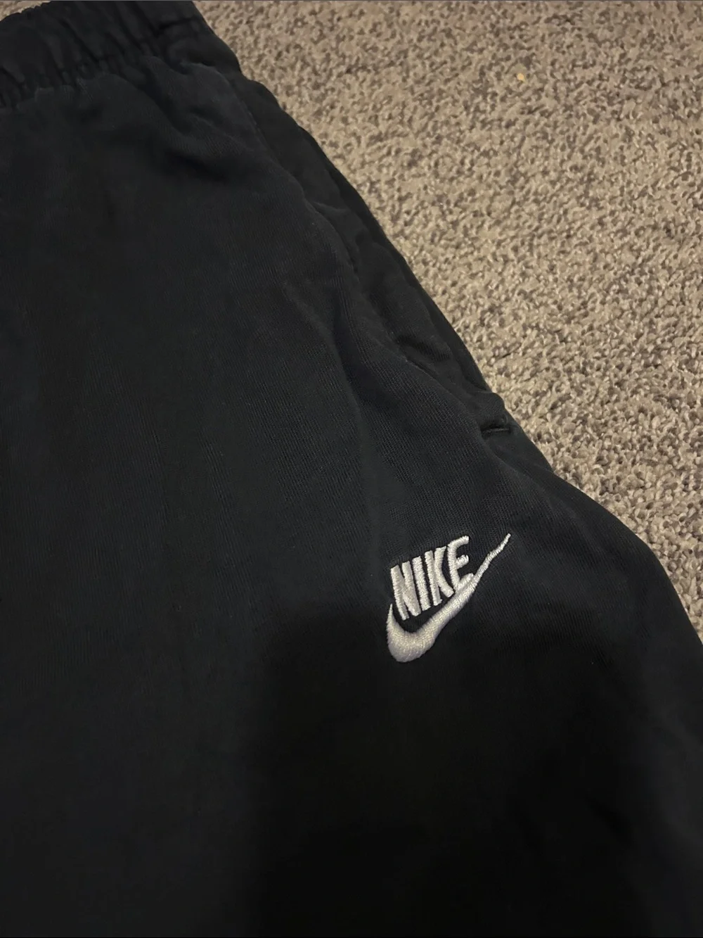 Nike Men's Black Jogger Sweatpants with White Swoosh